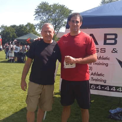 Vince and his dad at a local 5K just a year into his gym journey